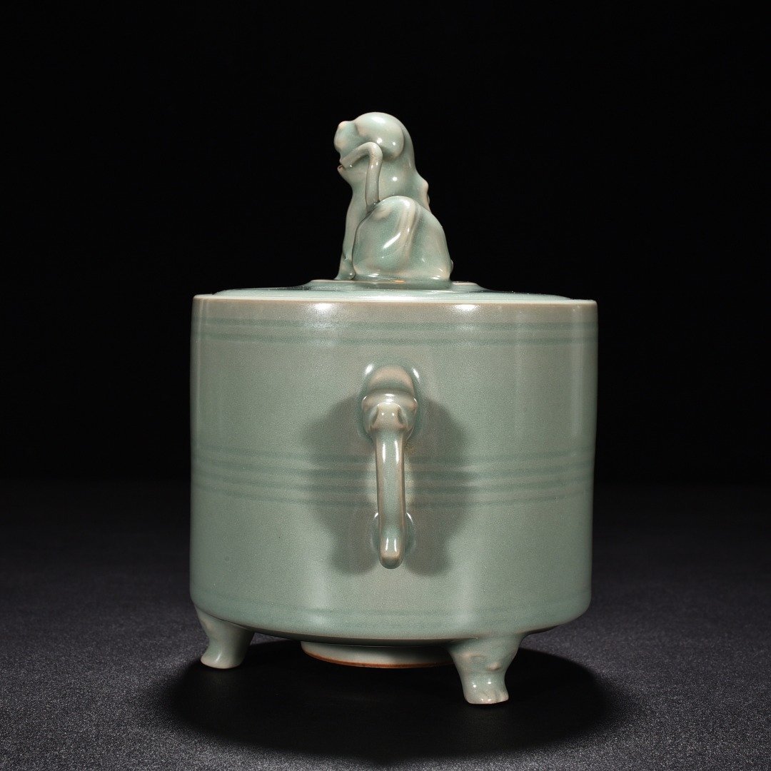 Song Dynasty Longquan kiln pink celadon glaze three-legged and double-eared smoker