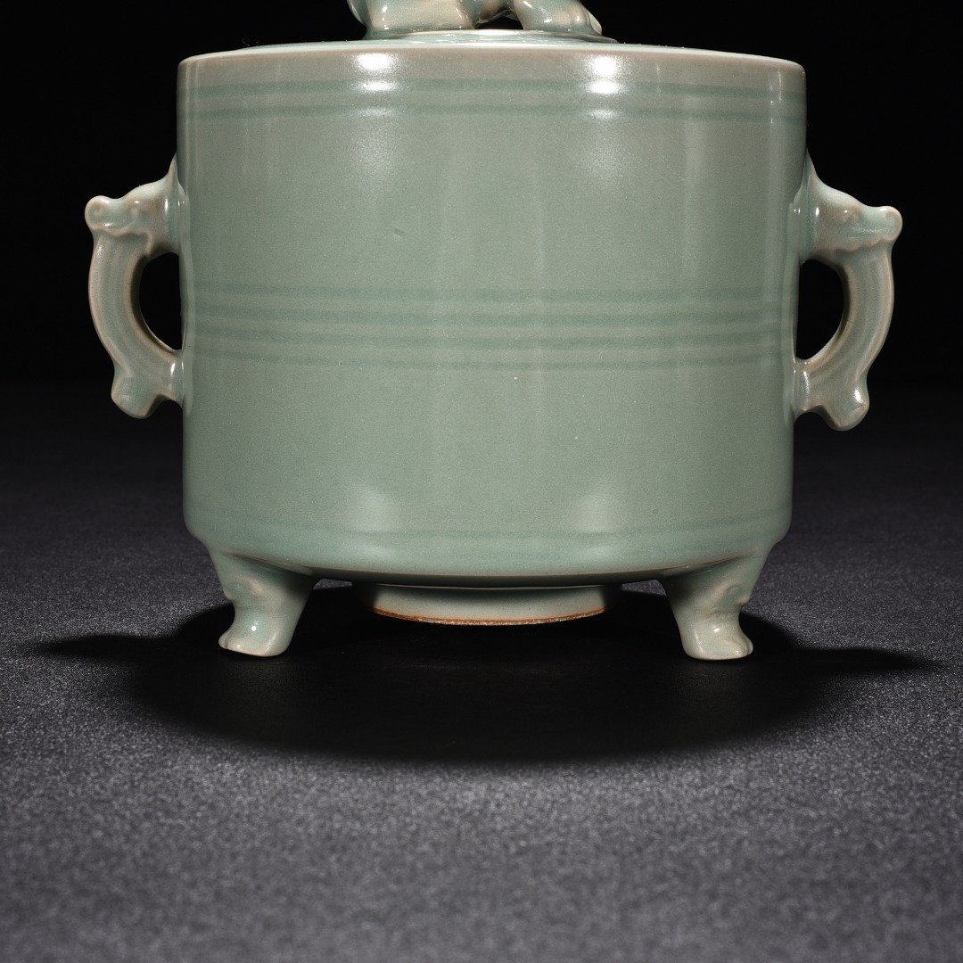 Song Dynasty Longquan kiln pink celadon glaze three-legged and double-eared smoker