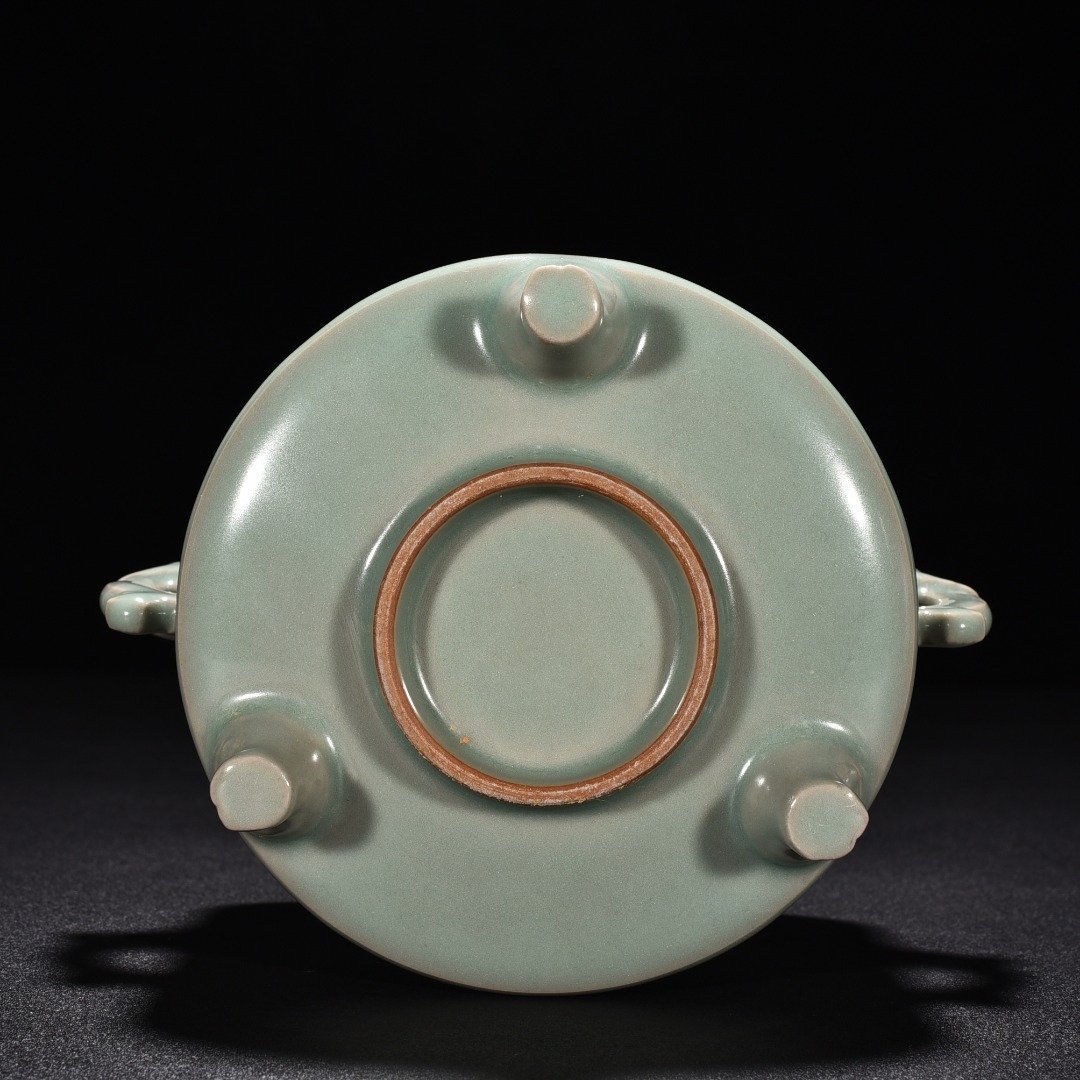 Song Dynasty Longquan kiln pink celadon glaze three-legged and double-eared smoker