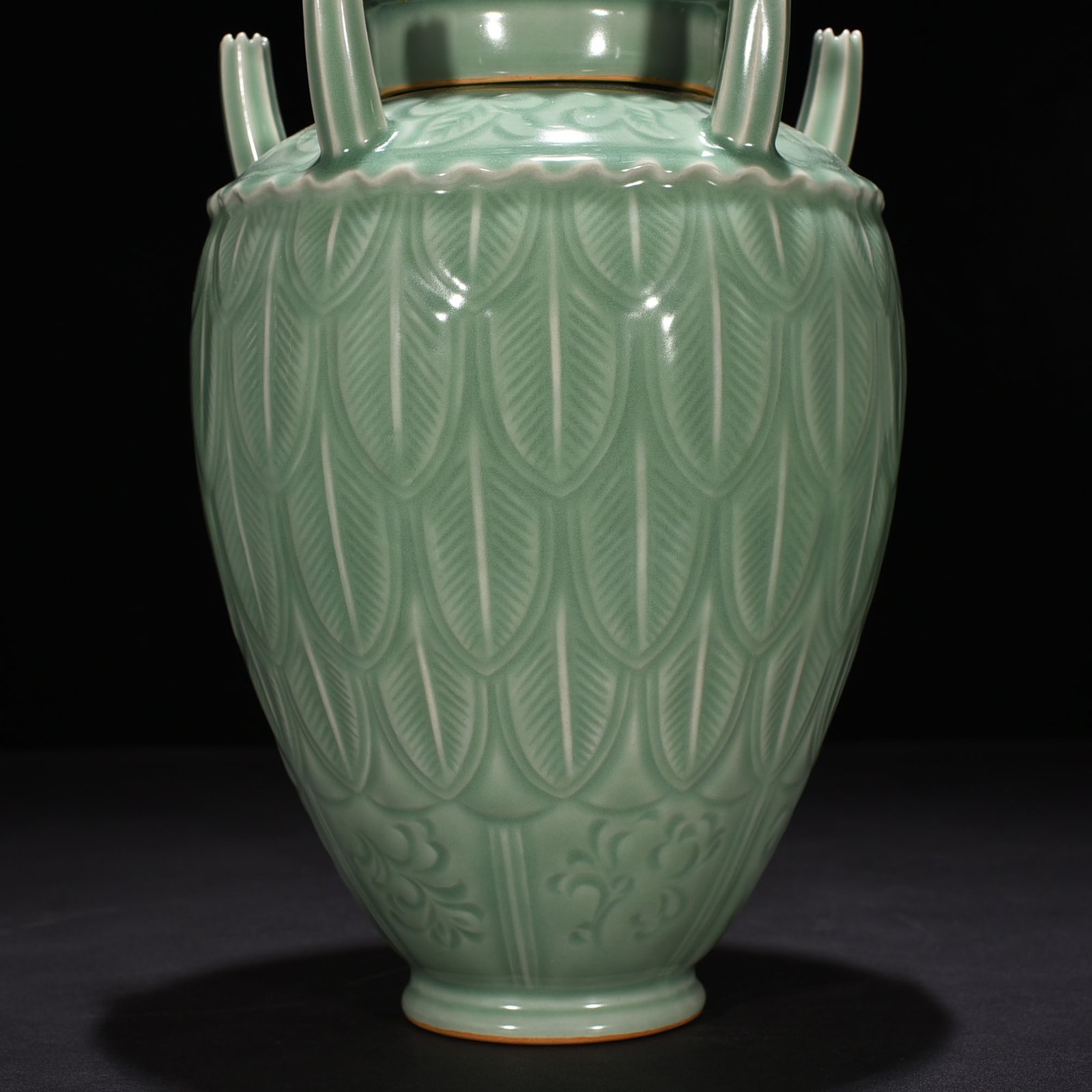 Song Dynasty Longquan kiln pink green glaze five-tube vase with banana leaf pattern