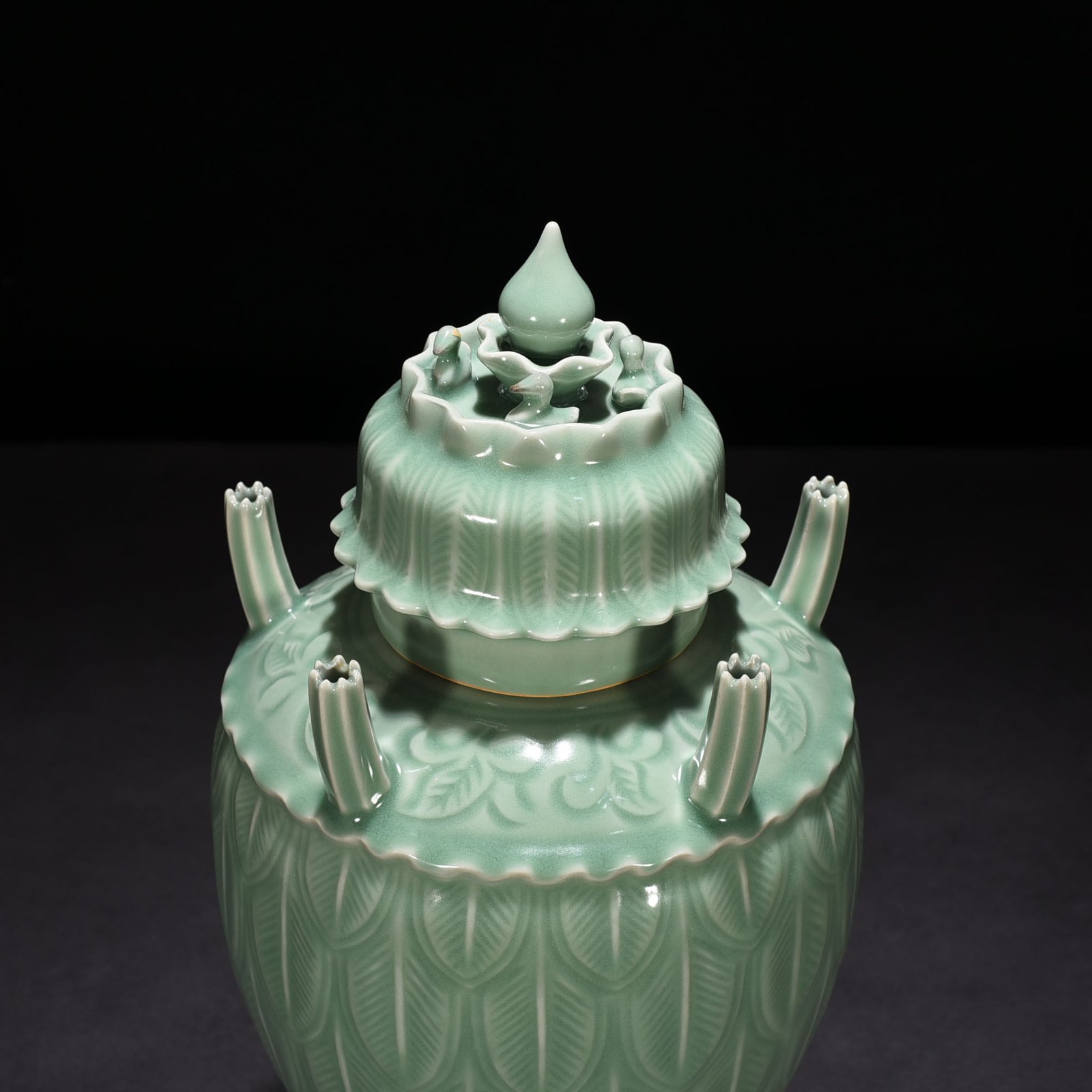Song Dynasty Longquan kiln pink green glaze five-tube vase with banana leaf pattern