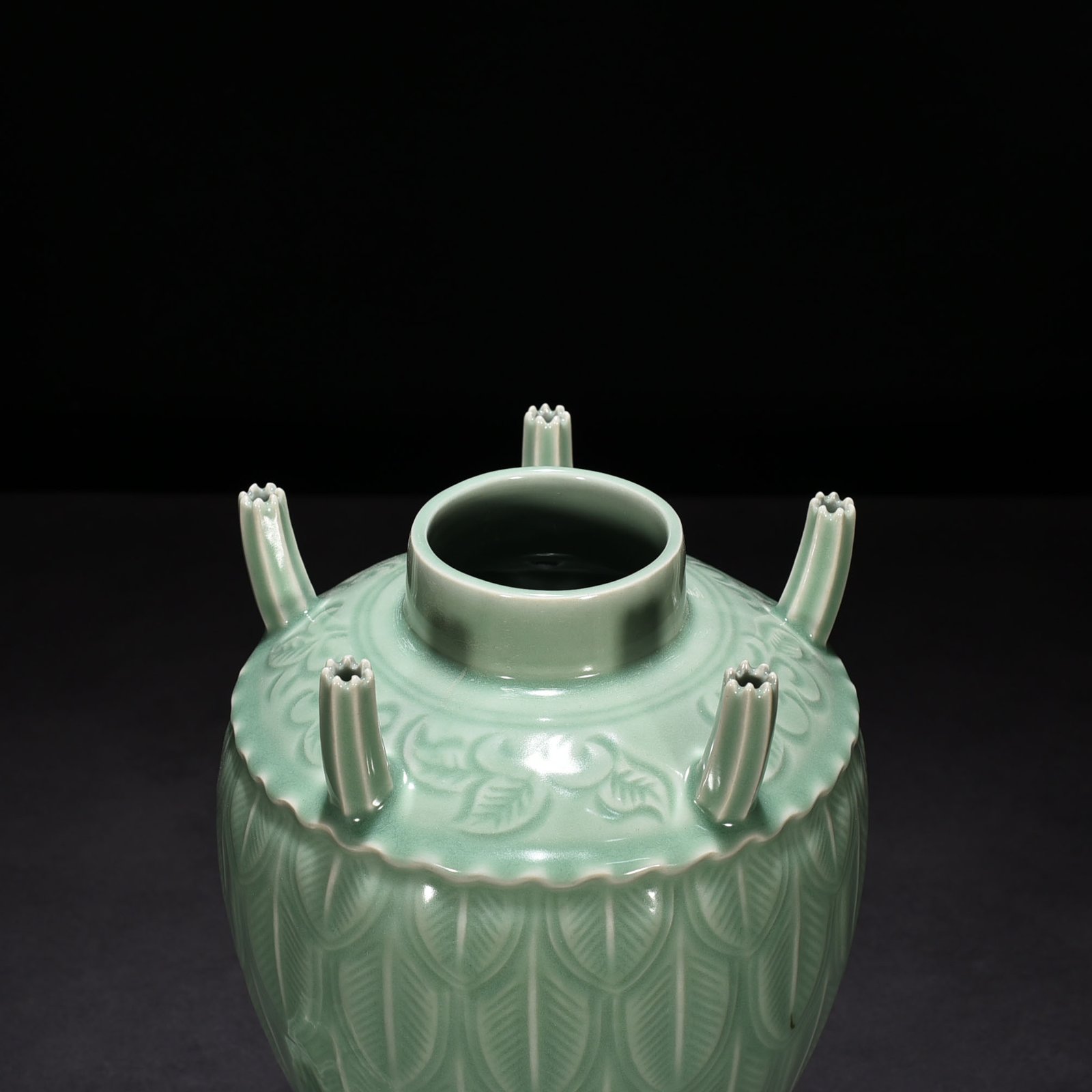 Song Dynasty Longquan kiln pink green glaze five-tube vase with banana leaf pattern