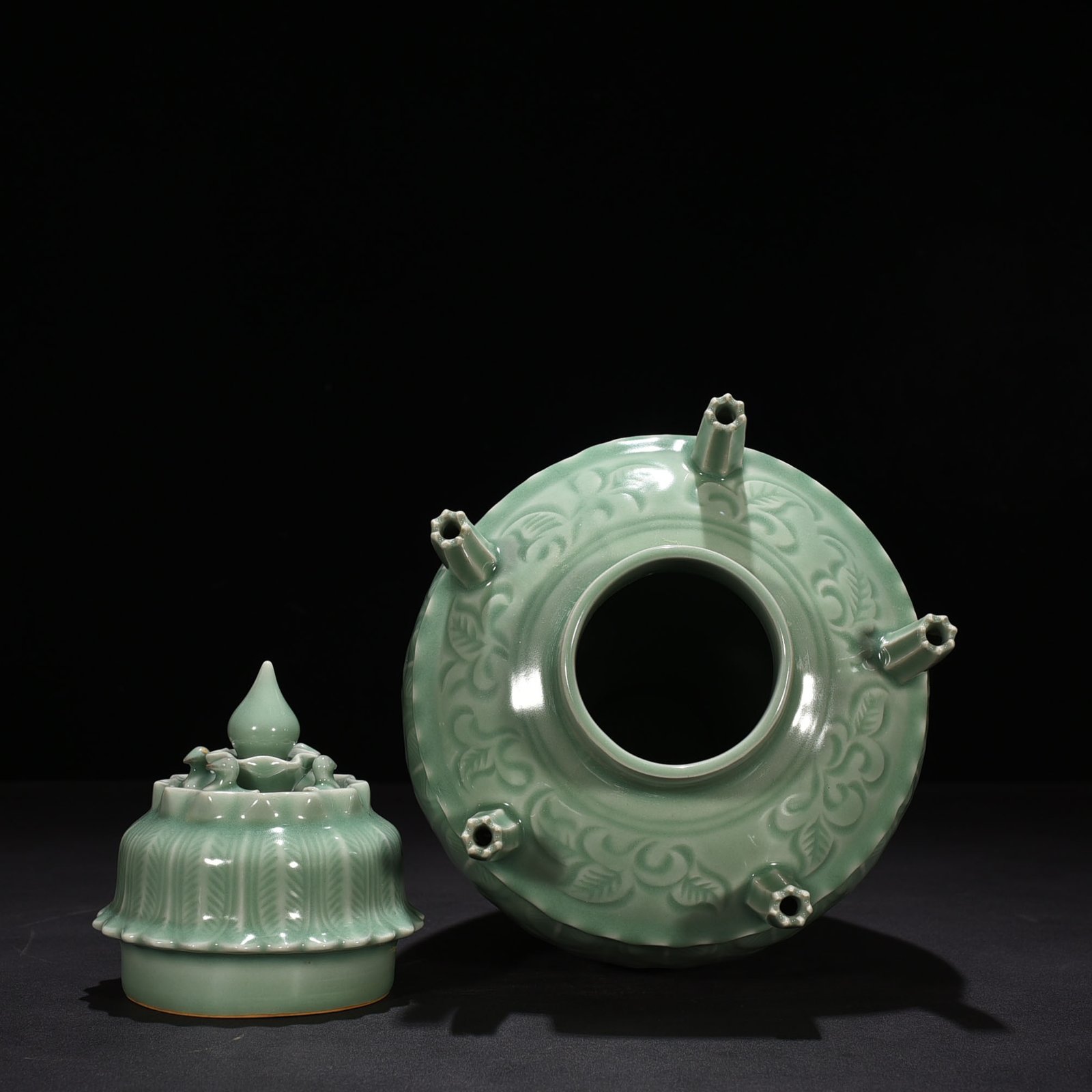 Song Dynasty Longquan kiln pink green glaze five-tube vase with banana leaf pattern