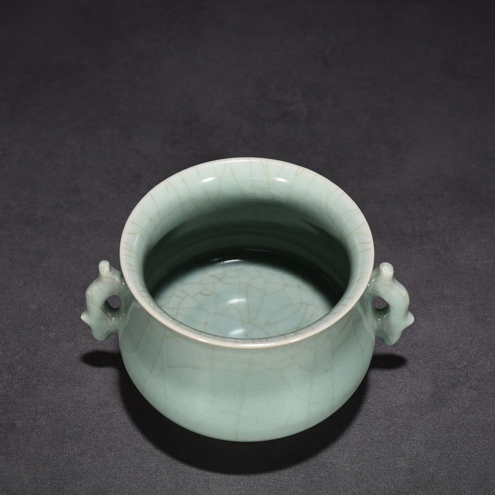 Song Dynasty Longquan kiln pink green glaze earthworm stove