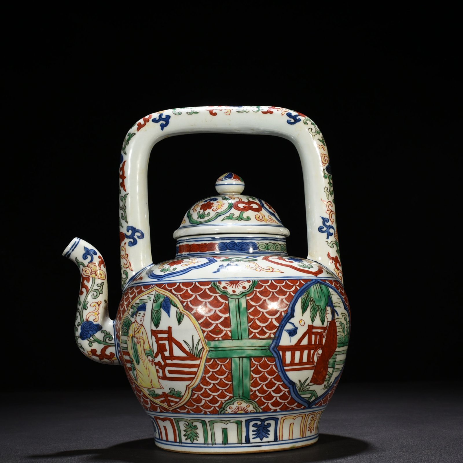 Ming Dynasty Jiajing blue and white multicolored windowed figure pattern handlebar teapot