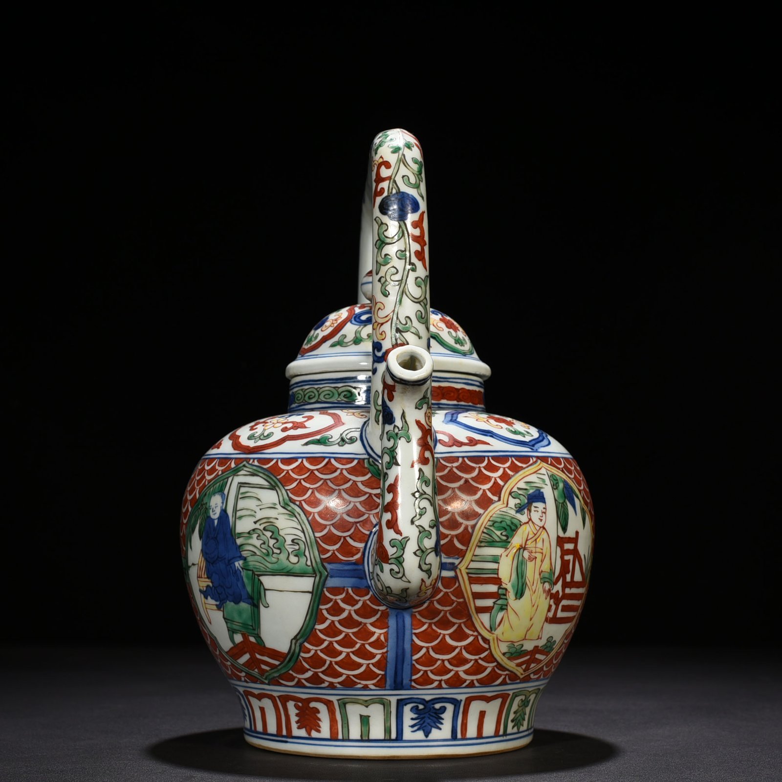 Ming Dynasty Jiajing blue and white multicolored windowed figure pattern handlebar teapot