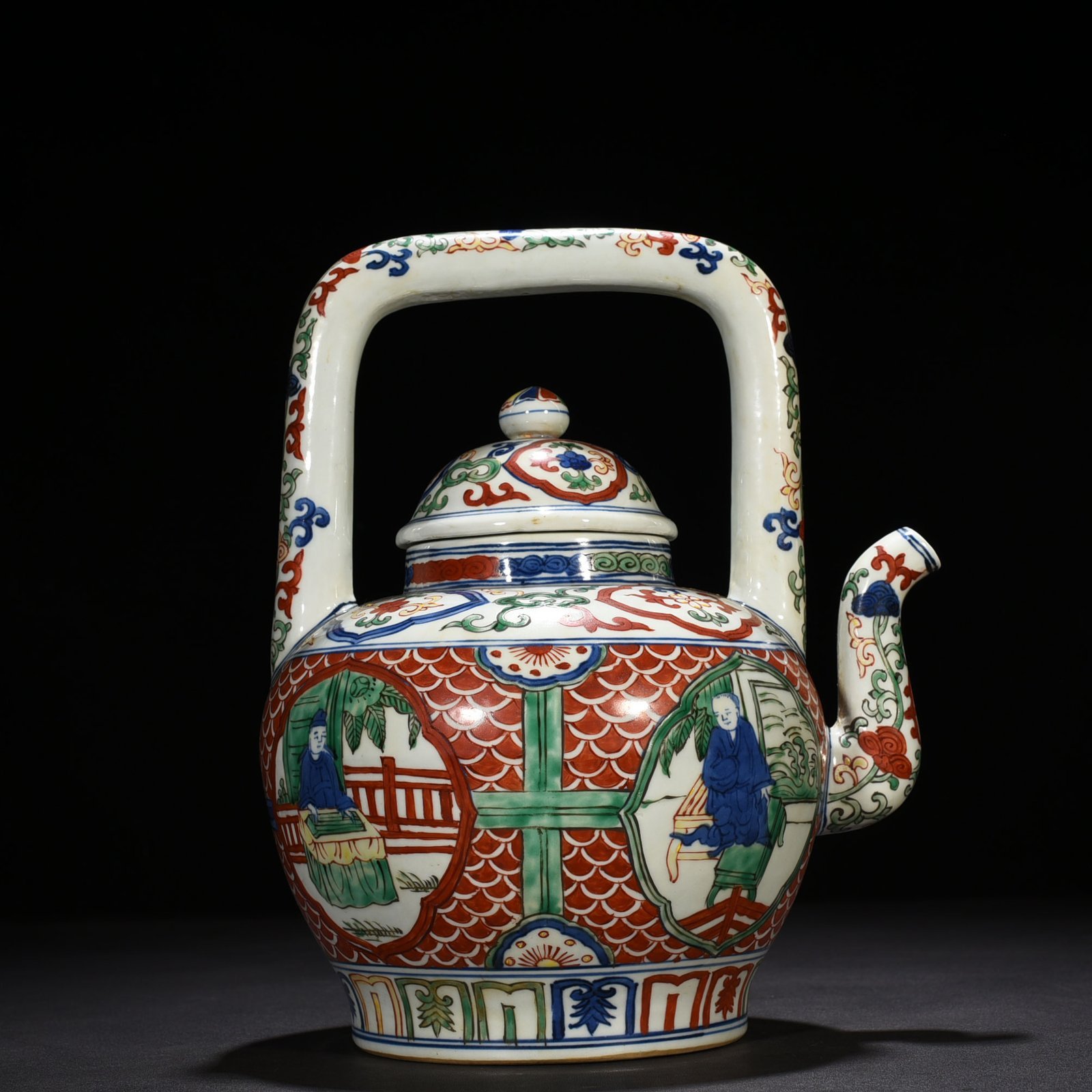 Ming Dynasty Jiajing blue and white multicolored windowed figure pattern handlebar teapot