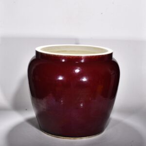 Ming Dynasty Xuande ruby ​​red glaze engraved cloud and dragon pattern scroll vat