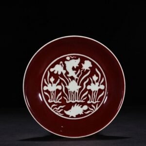 Ming Dynasty Xuande ruby ​​red glaze engraved fish and algae pattern plate
