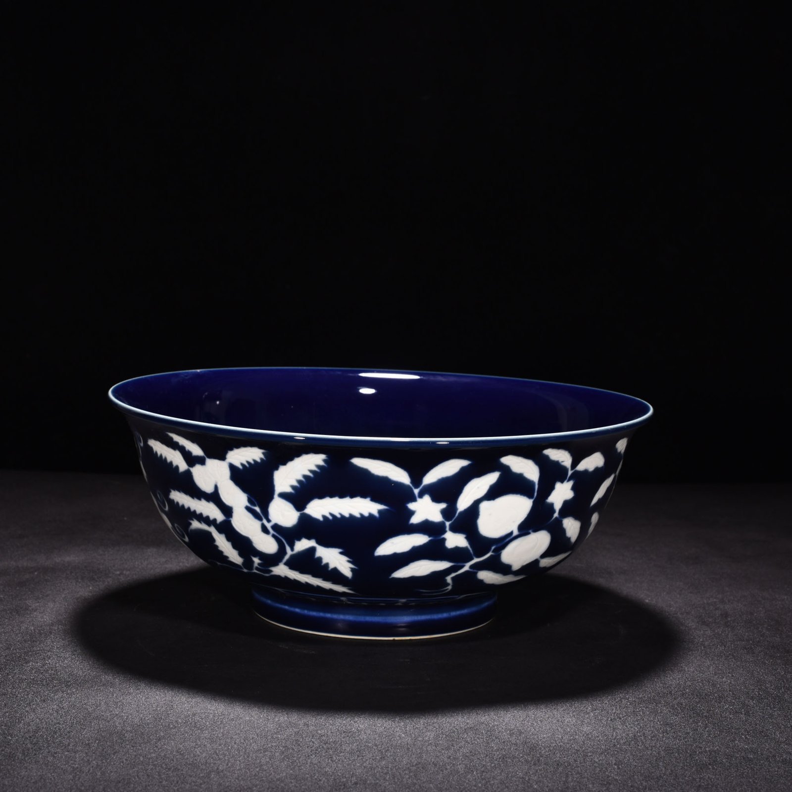 Ming Dynasty Xuande sapphire blue glaze blank carved fruit pattern bowl