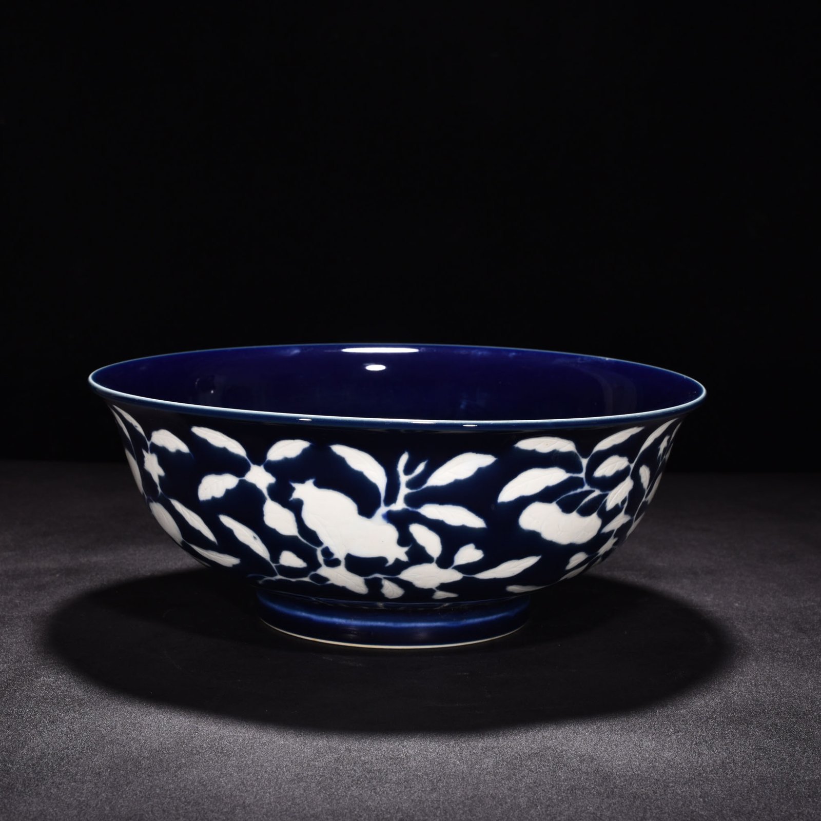 Ming Dynasty Xuande sapphire blue glaze blank carved fruit pattern bowl