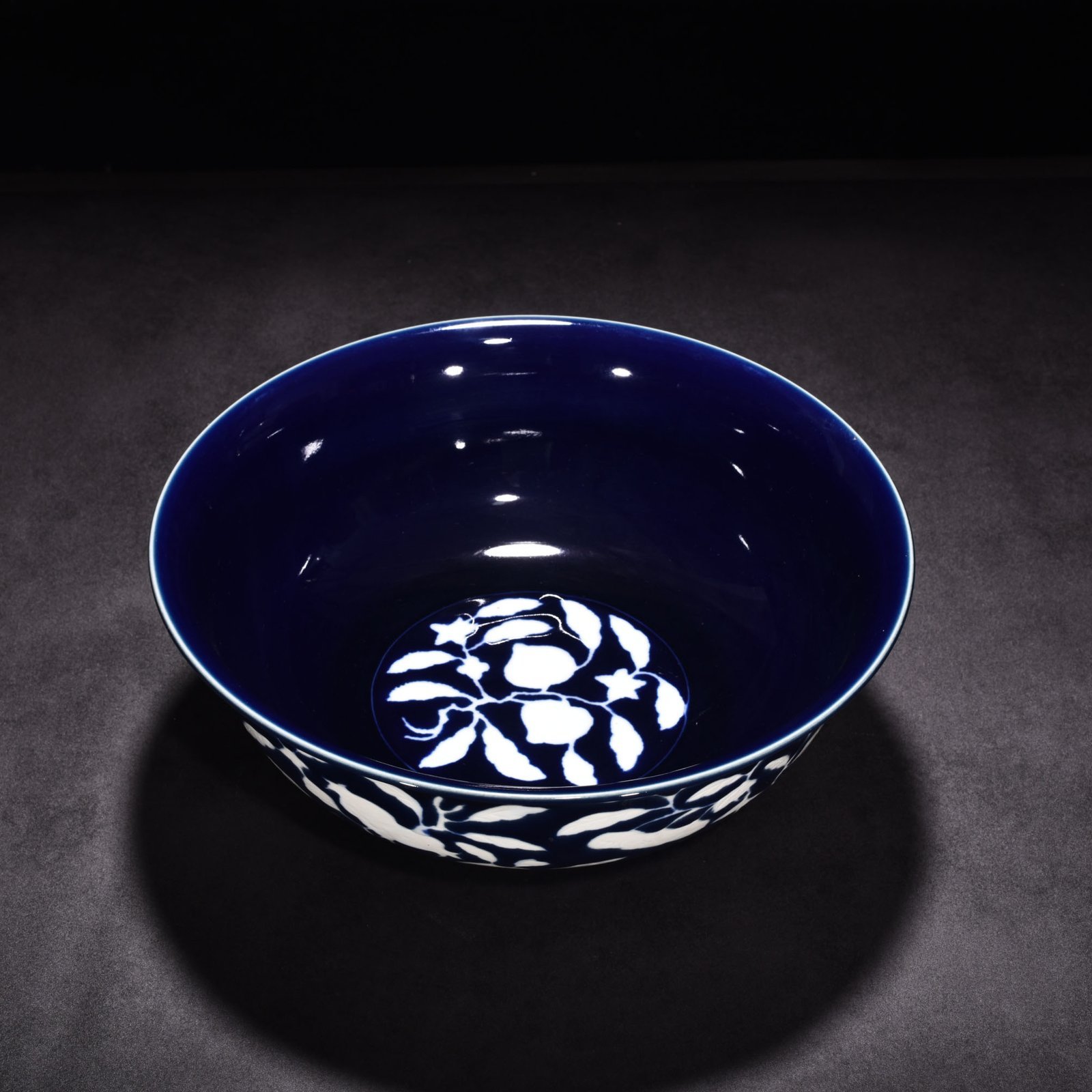 Ming Dynasty Xuande sapphire blue glaze blank carved fruit pattern bowl
