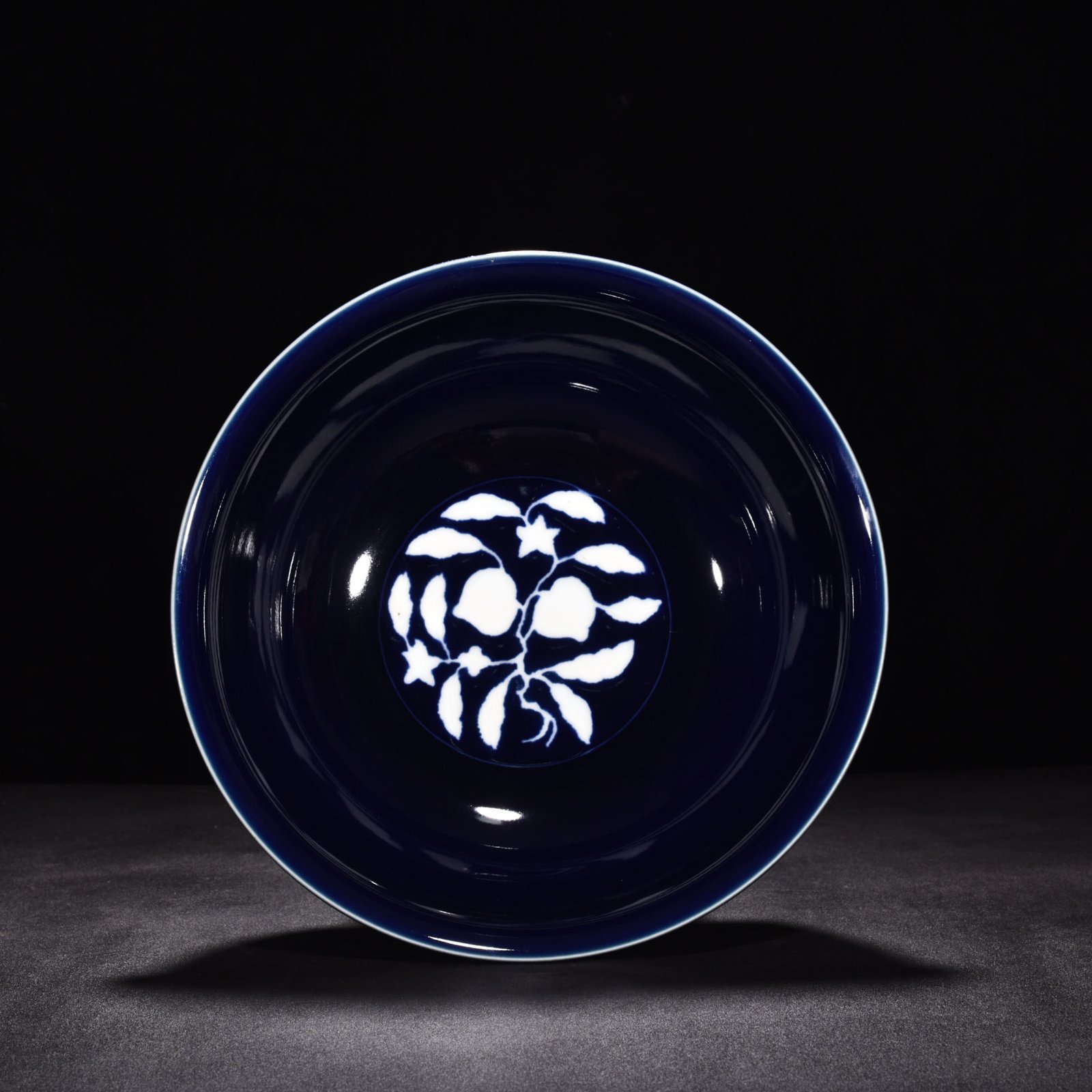 Ming Dynasty Xuande sapphire blue glaze blank carved fruit pattern bowl