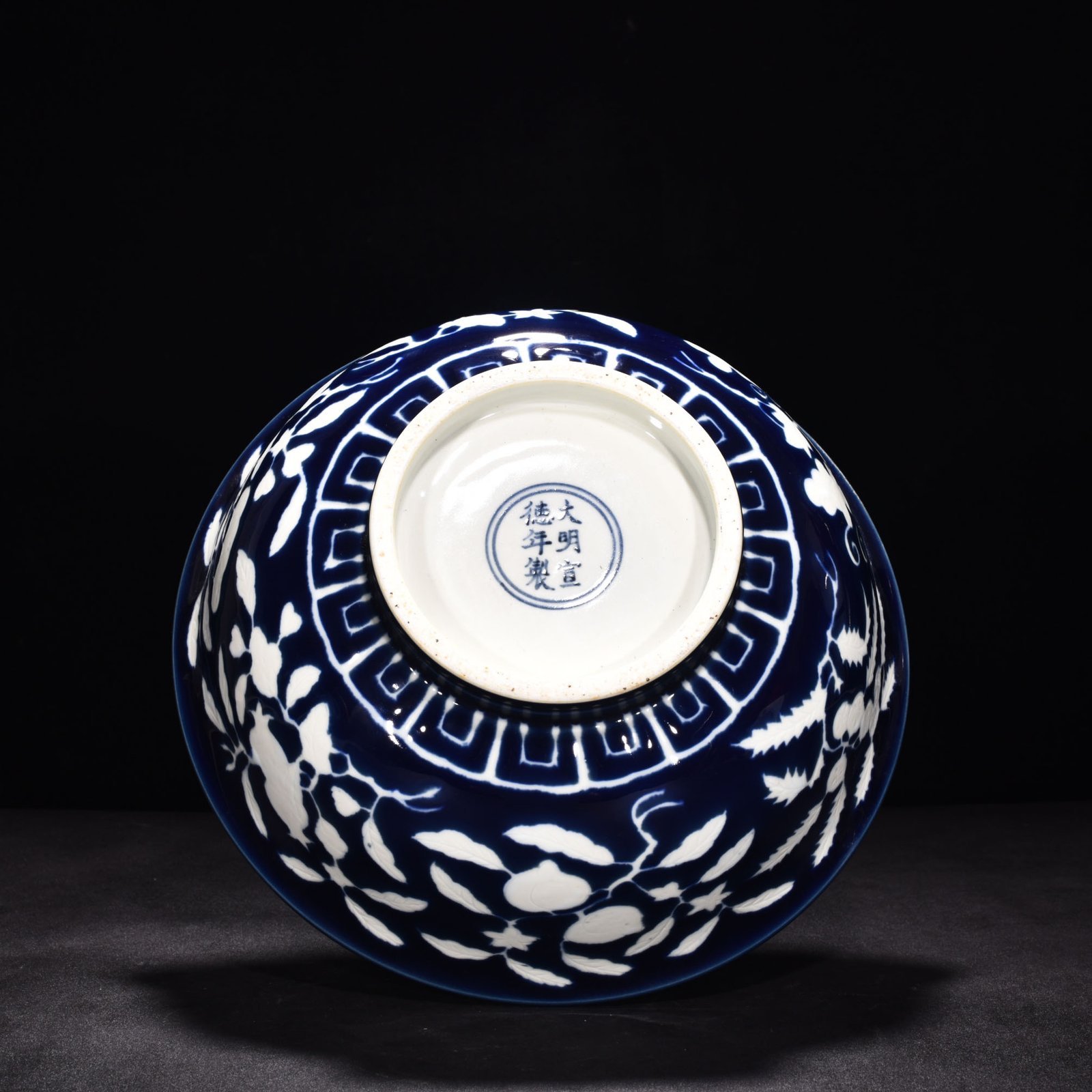 Ming Dynasty Xuande sapphire blue glaze blank carved fruit pattern bowl