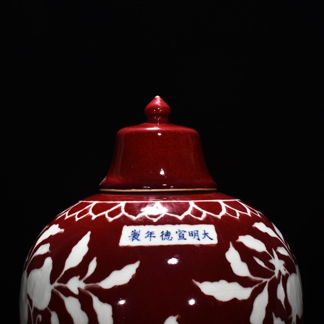 Ming Dynasty Xuande gem-glazed white plum vase with engraved branch flower and fruit