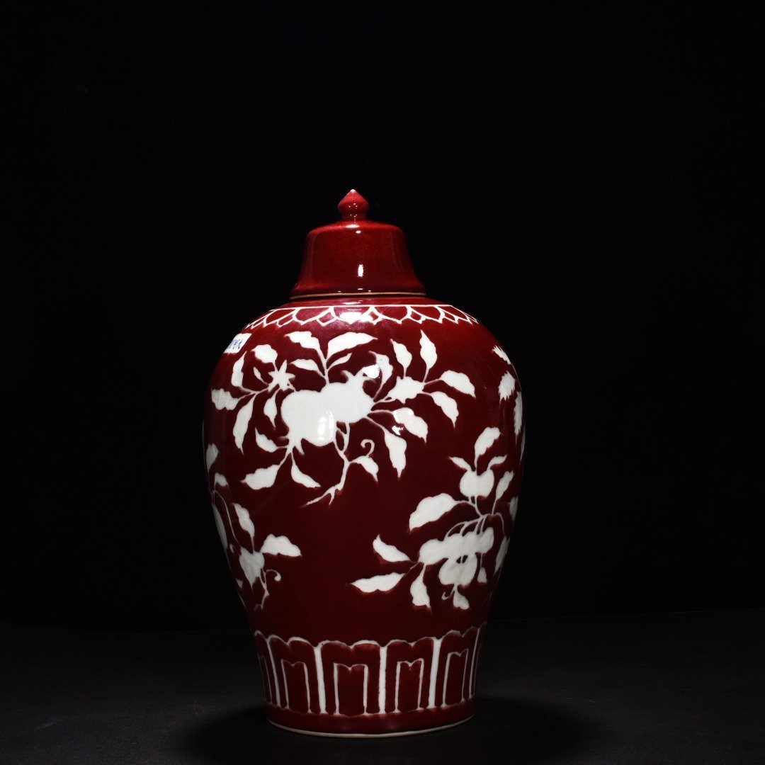 Ming Dynasty Xuande gem-glazed white plum vase with engraved branch flower and fruit