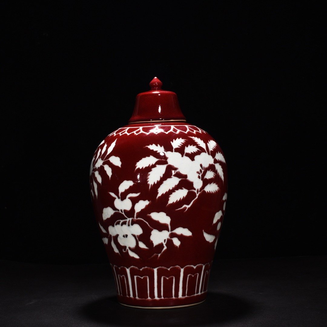 Ming Dynasty Xuande gem-glazed white plum vase with engraved branch flower and fruit