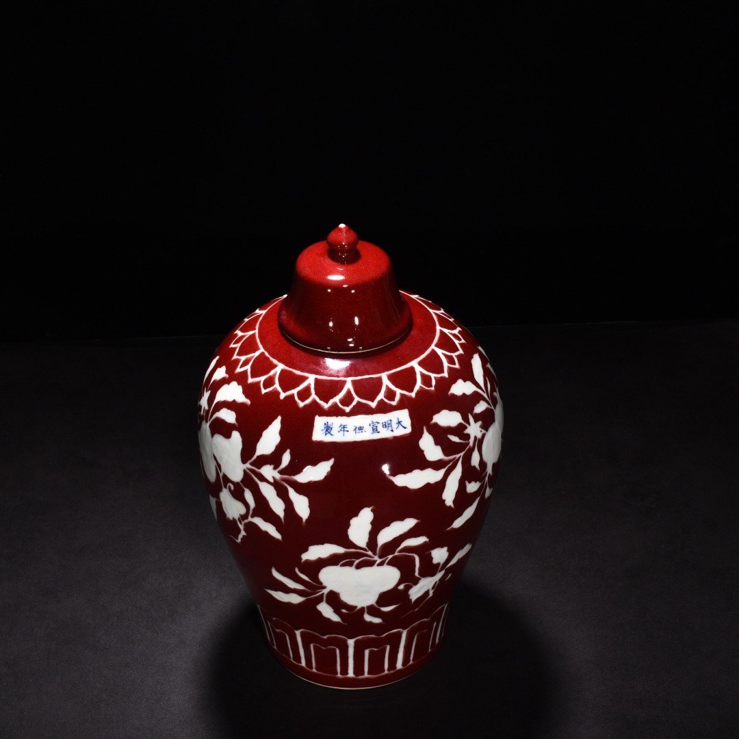 Ming Dynasty Xuande gem-glazed white plum vase with engraved branch flower and fruit