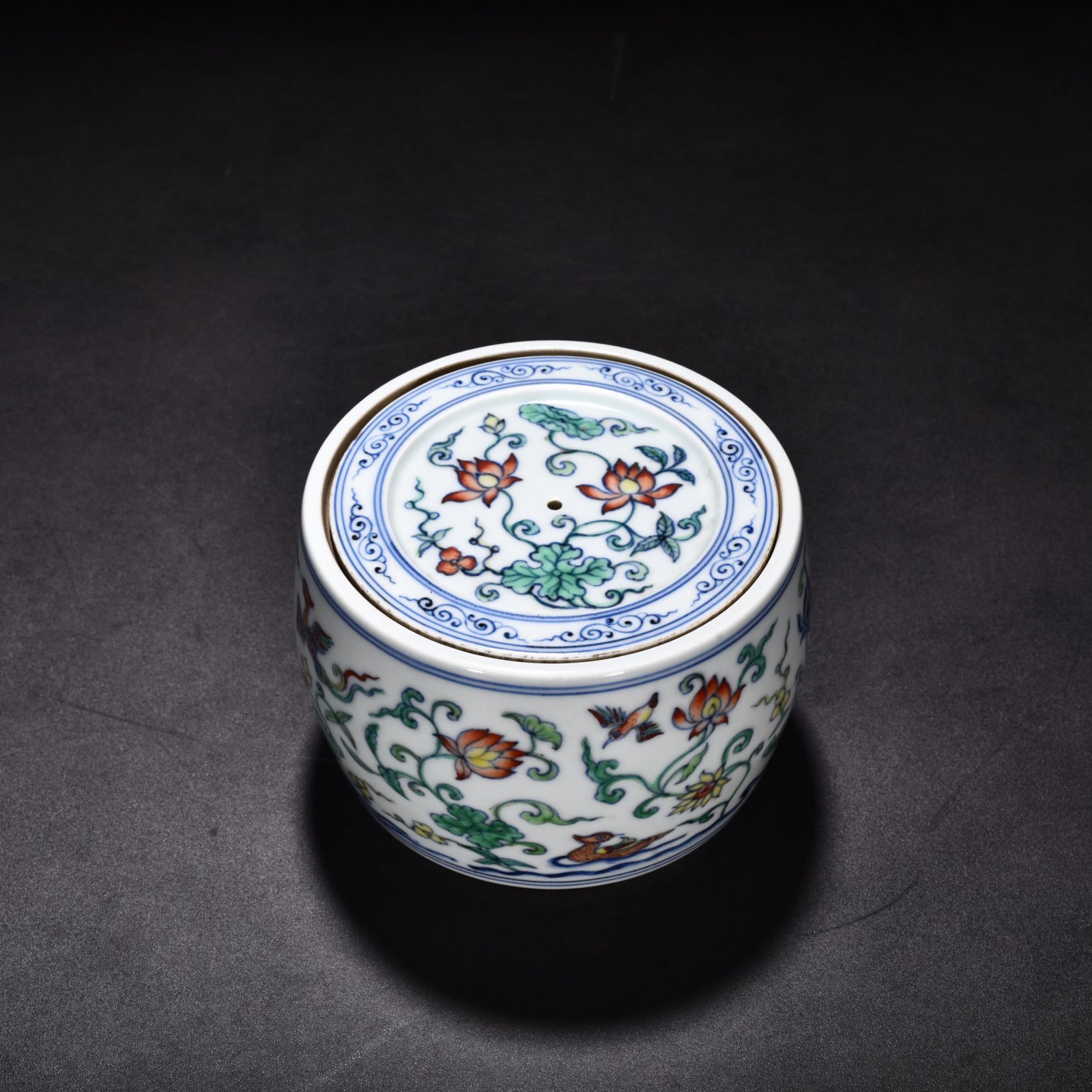 Ming Dynasty Xuande Doucai Lotus Pond Cricket Jar with Mandarin Duck Pattern