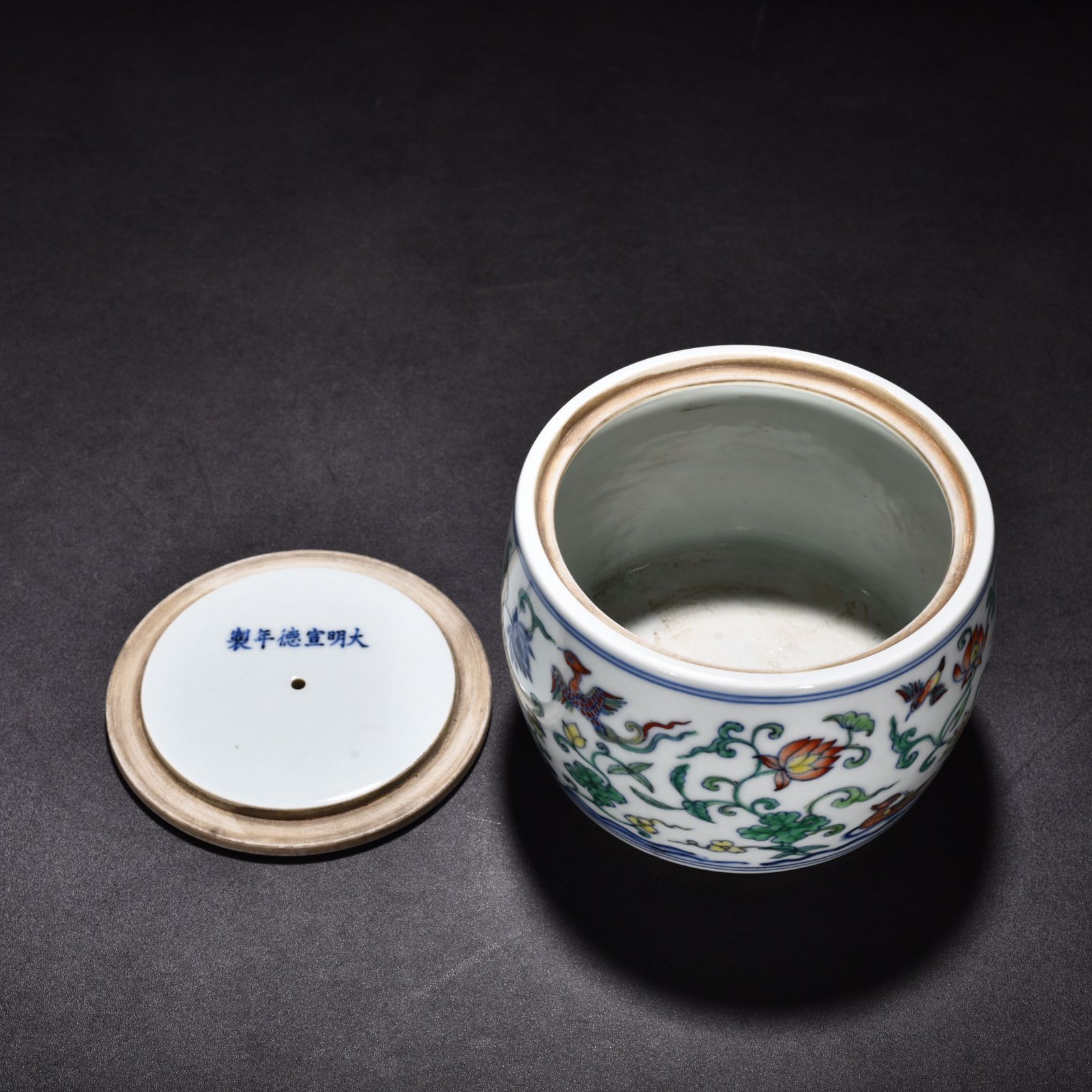 Ming Dynasty Xuande Doucai Lotus Pond Cricket Jar with Mandarin Duck Pattern
