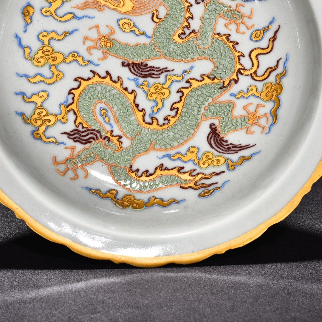 Ming Dynasty Xuande lilac powder painted gold cloud dragon pattern rhombus mouth plate