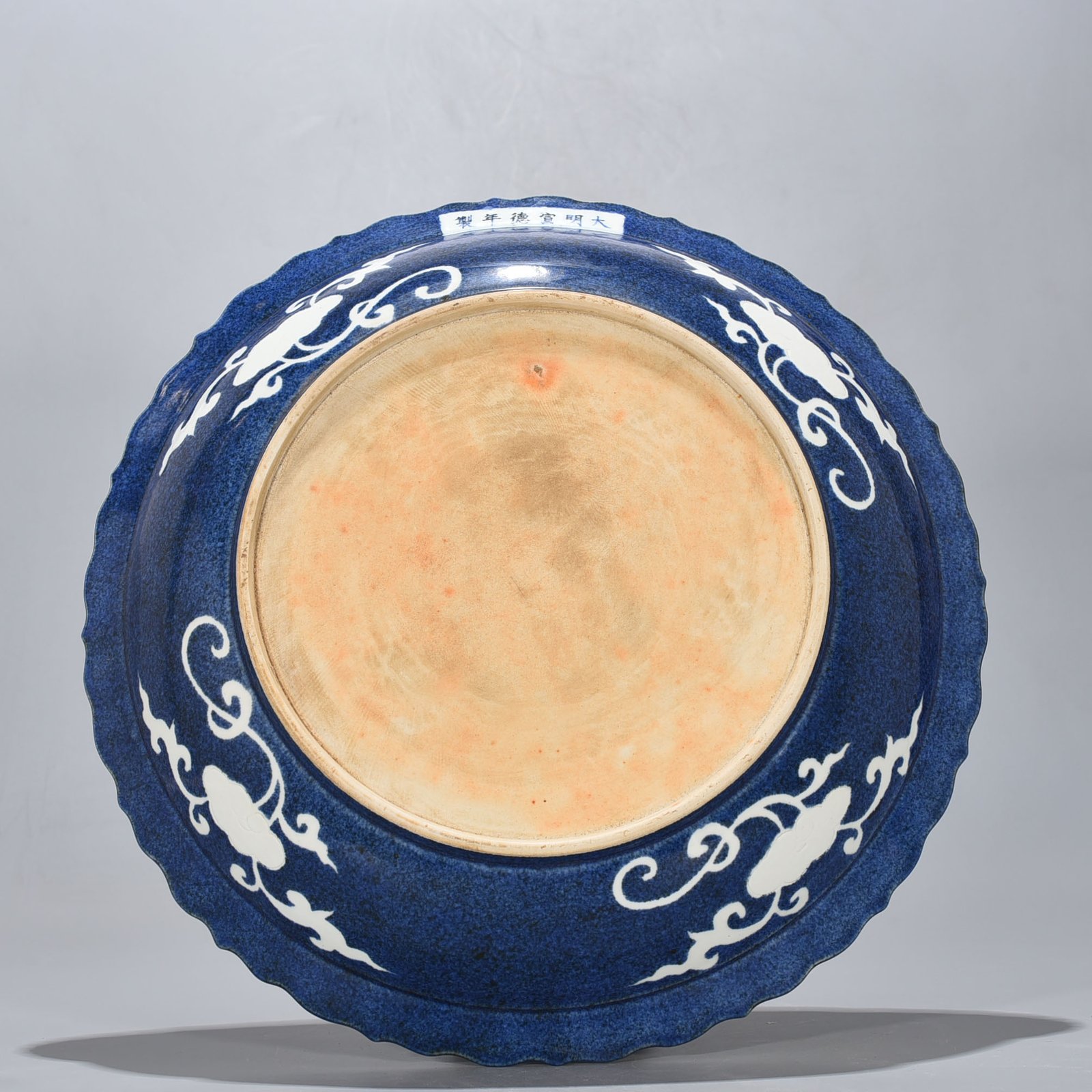 Ming Dynasty Xuande blue glaze carved double phoenix pattern rhombus edge folding plate