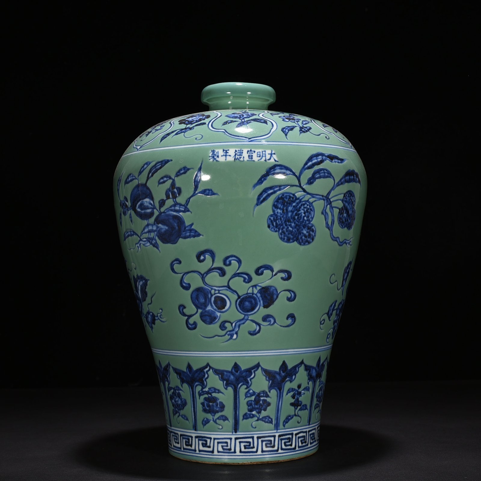 Ming Dynasty Xuande coral green ground blue and white plum vase with folded branches