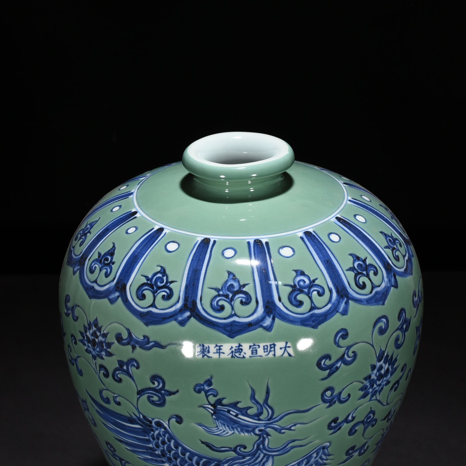 Ming Dynasty Xuande coral green ground blue and white plum vase