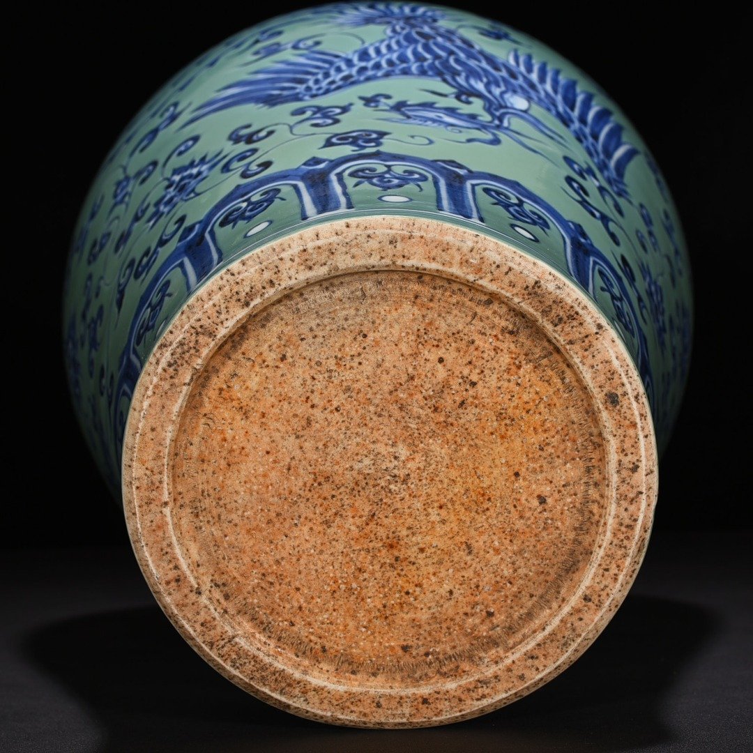 Ming Dynasty Xuande coral green ground blue and white plum vase