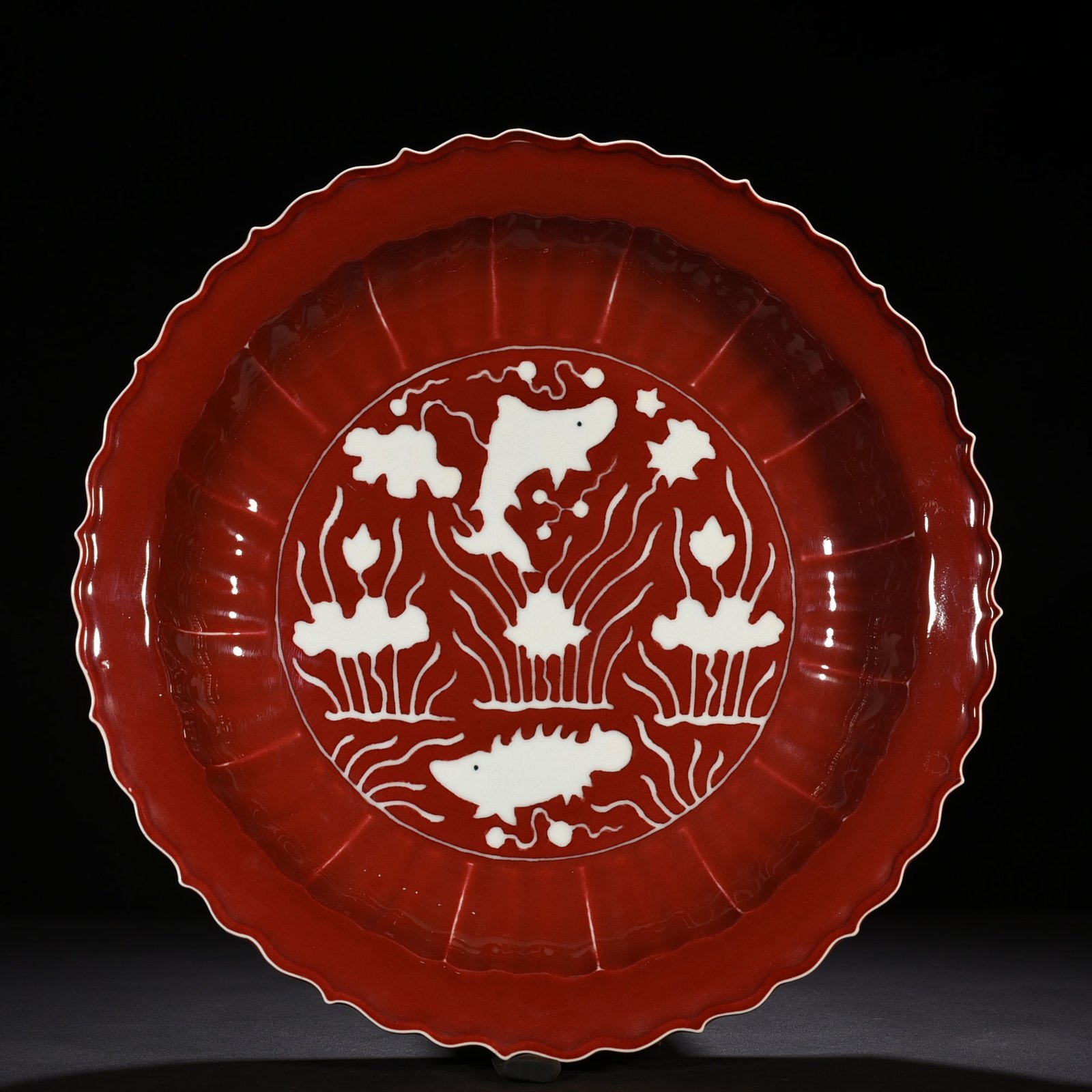 Ming Dynasty Xuande sacrifice red glaze engraved white fish and algae rhombus edge folding plate