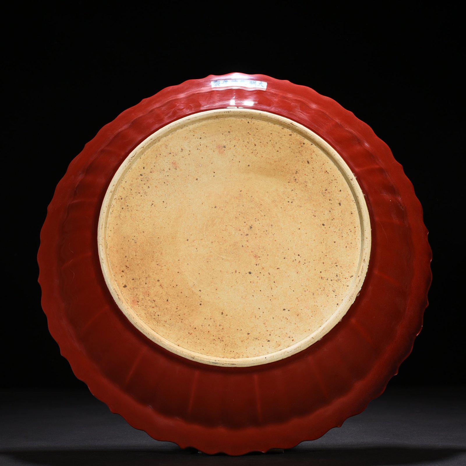Ming Dynasty Xuande sacrifice red glaze engraved white fish and algae rhombus edge folding plate