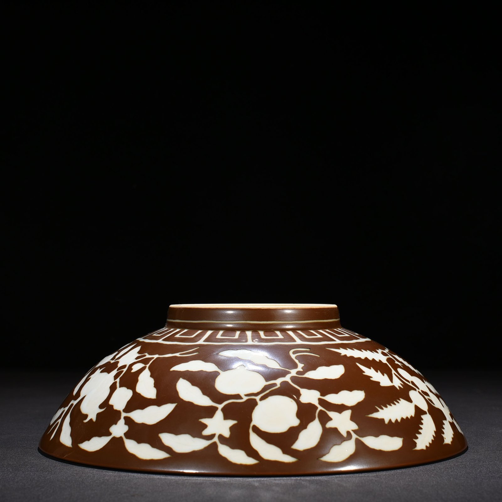 Ming Dynasty Xuande purple gold glaze dice bowl with folded branches