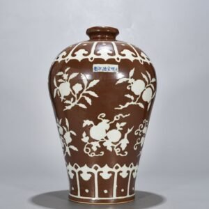 Ming Dynasty Xuande purple gold glaze carved plum vase with folded branches