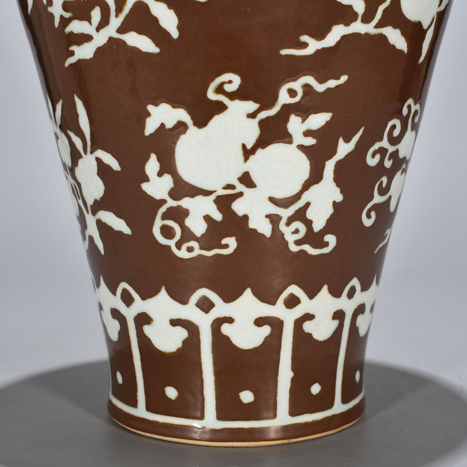 Ming Dynasty Xuande purple gold glaze carved plum vase with folded branches