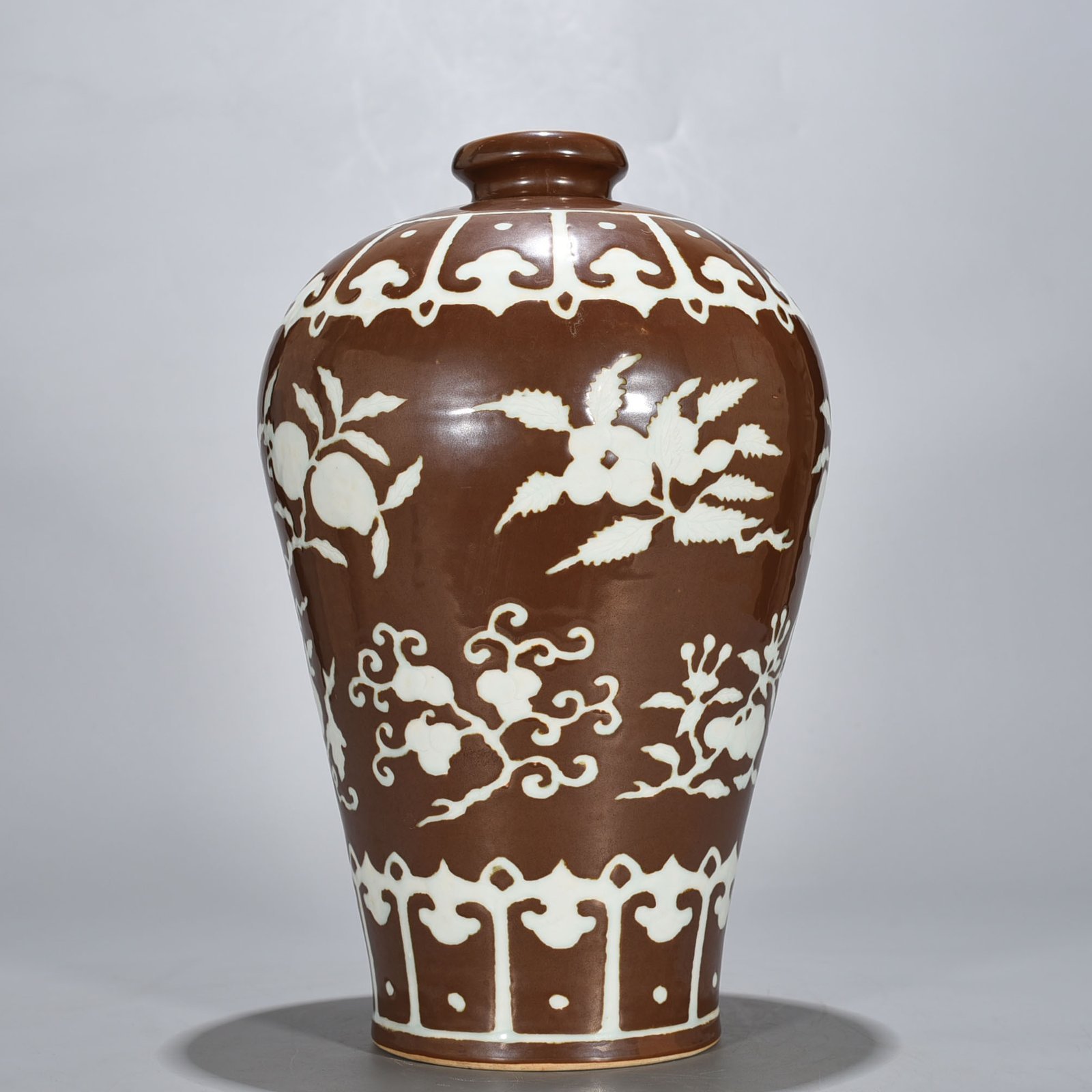 Ming Dynasty Xuande purple gold glaze carved plum vase with folded branches