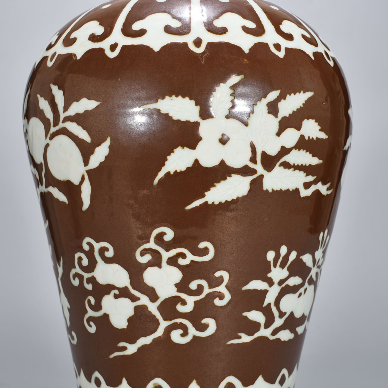 Ming Dynasty Xuande purple gold glaze carved plum vase with folded branches