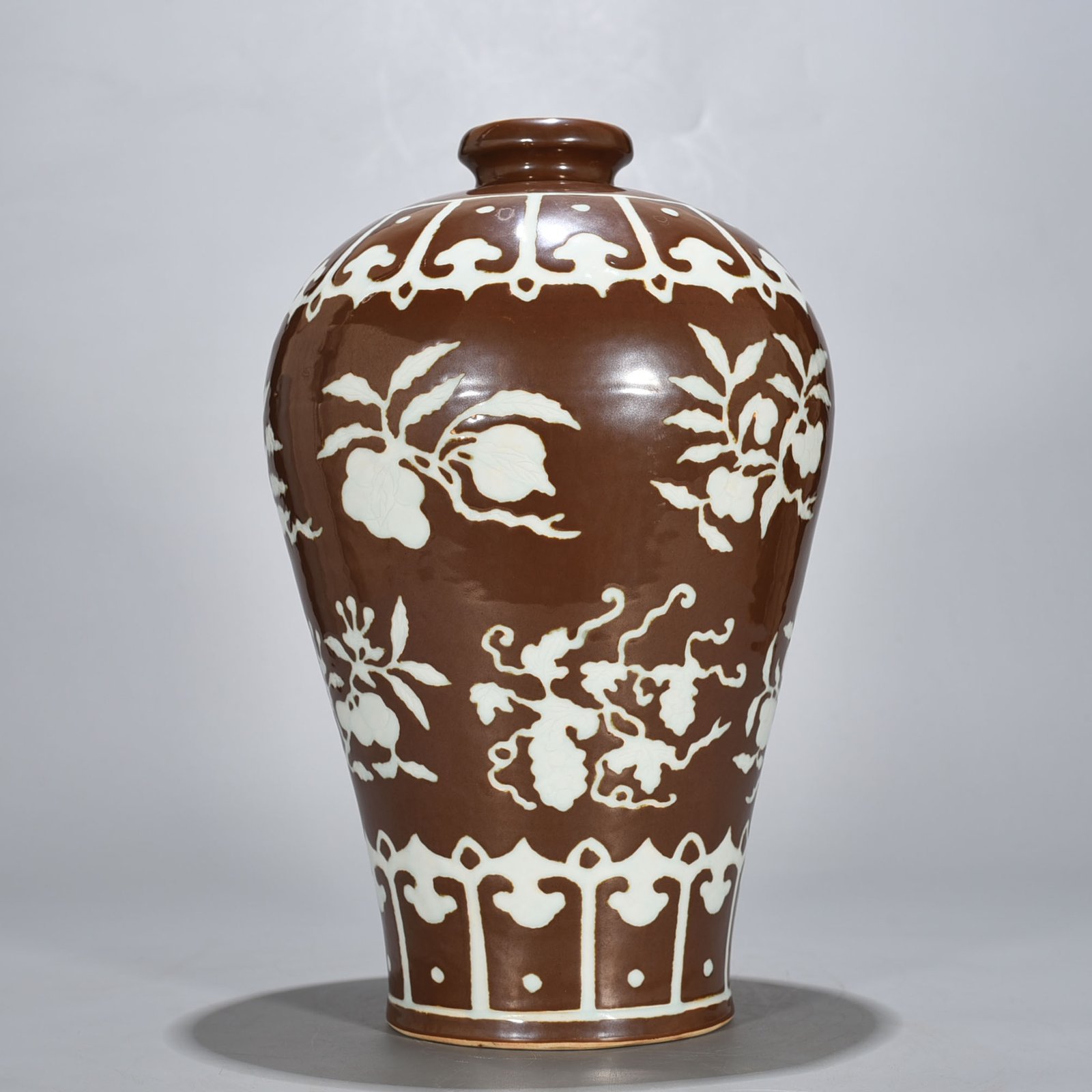 Ming Dynasty Xuande purple gold glaze carved plum vase with folded branches