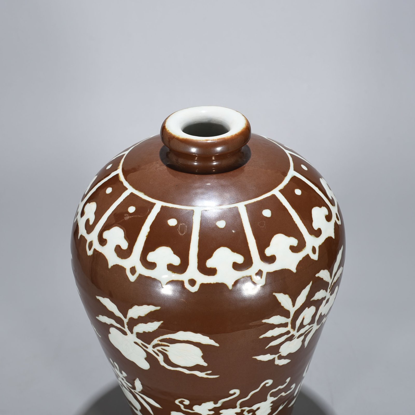 Ming Dynasty Xuande purple gold glaze carved plum vase with folded branches