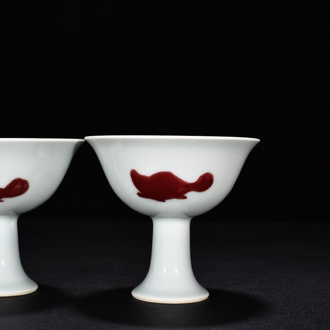 Ming Dynasty Xuande underglaze red three-fish goblet