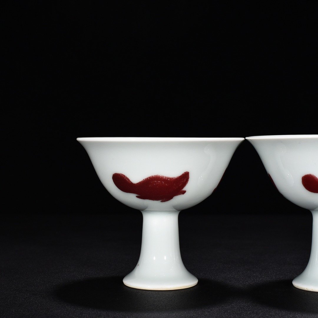 Ming Dynasty Xuande underglaze red three-fish goblet