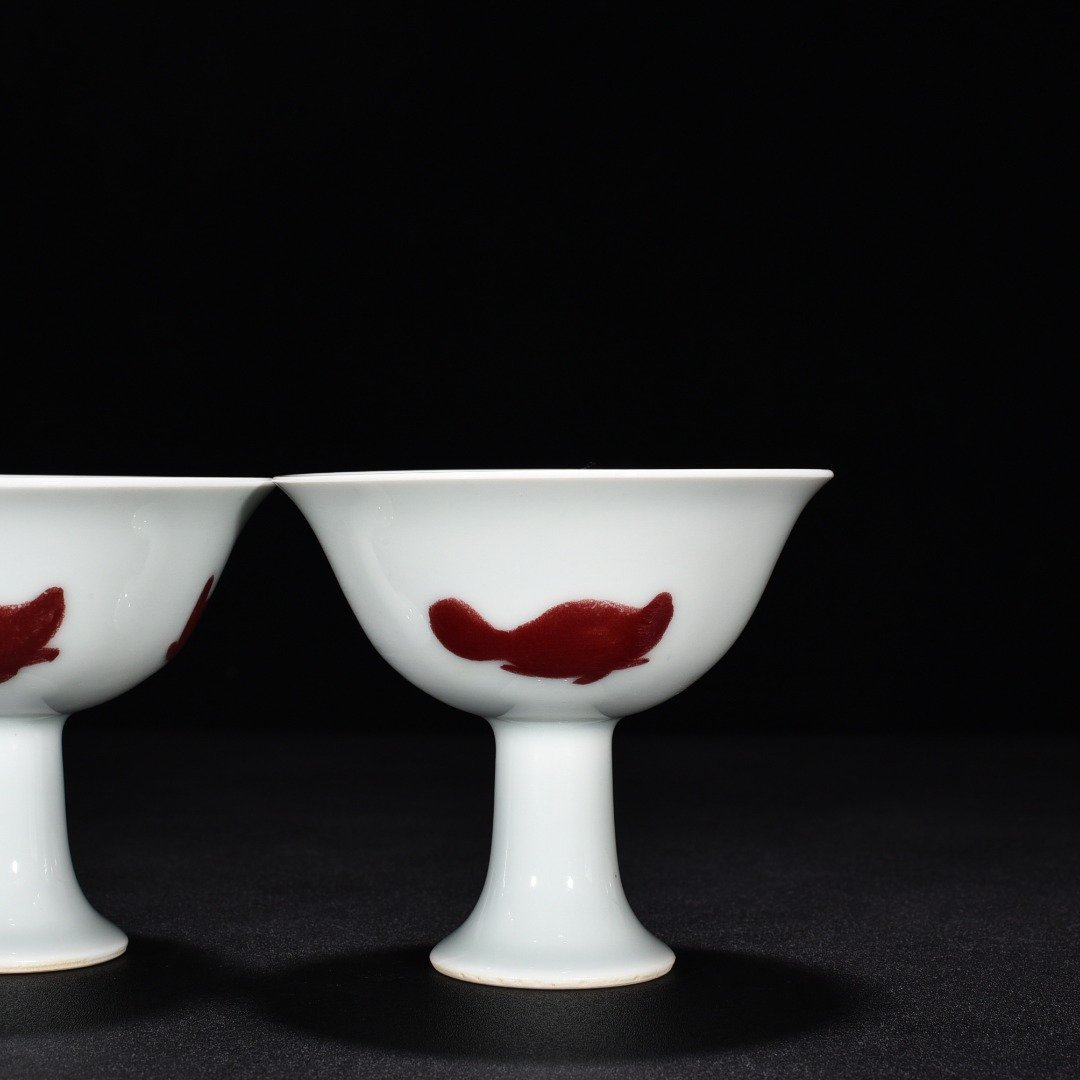 Ming Dynasty Xuande underglaze red three-fish goblet