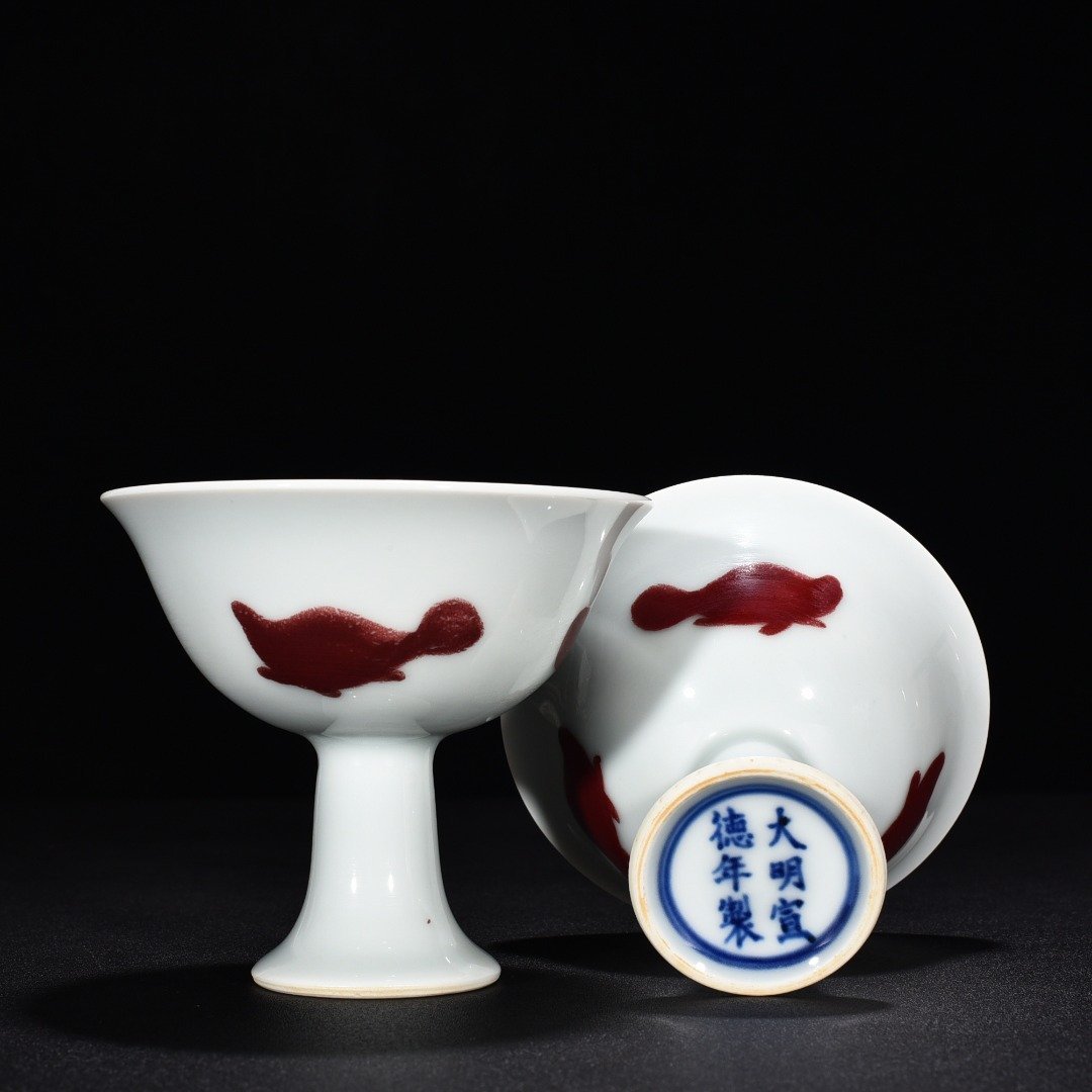 Ming Dynasty Xuande underglaze red three-fish goblet