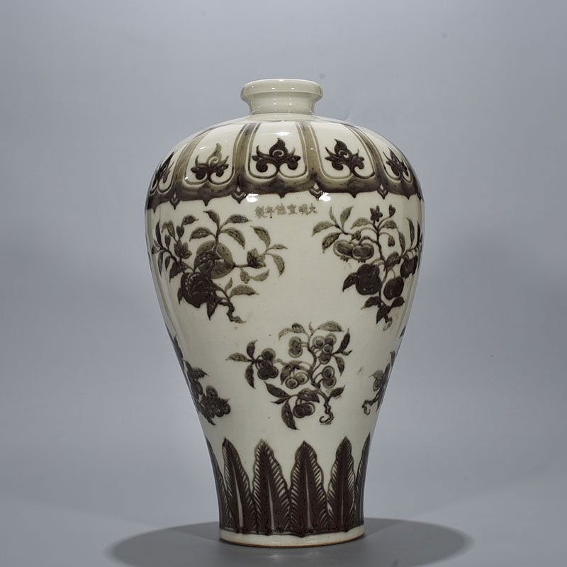 Ming Dynasty Xuande underglaze red plum vase with folded branches