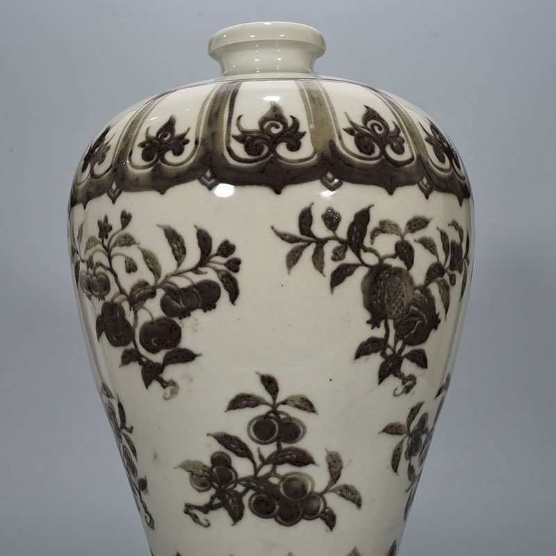 Ming Dynasty Xuande underglaze red plum vase with folded branches