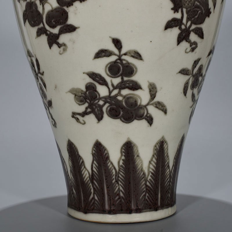 Ming Dynasty Xuande underglaze red plum vase with folded branches
