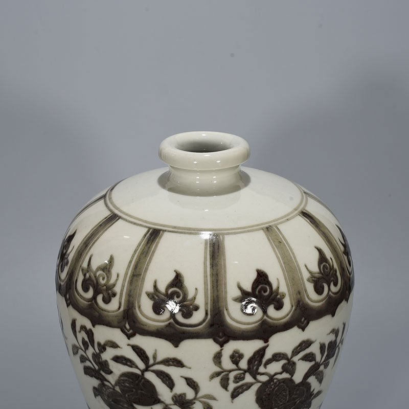 Ming Dynasty Xuande underglaze red plum vase with folded branches