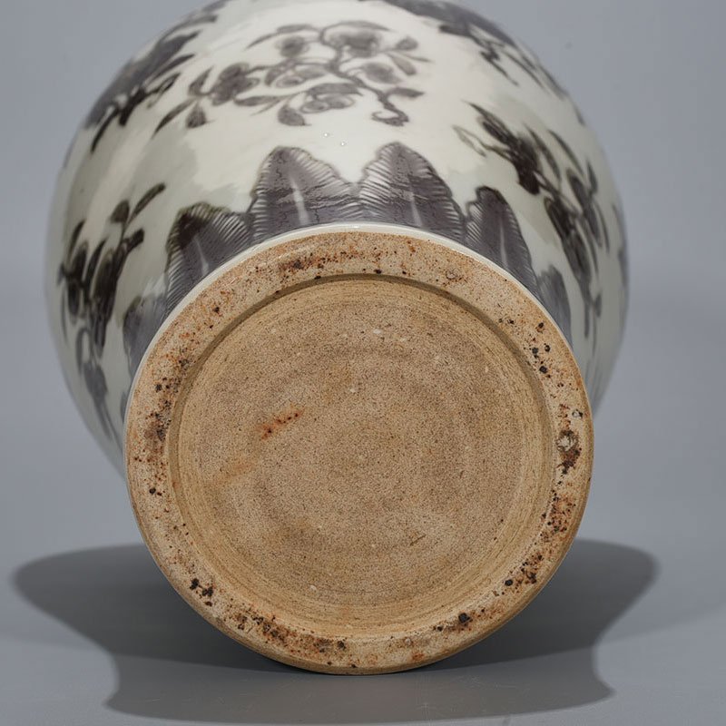 Ming Dynasty Xuande underglaze red plum vase with folded branches