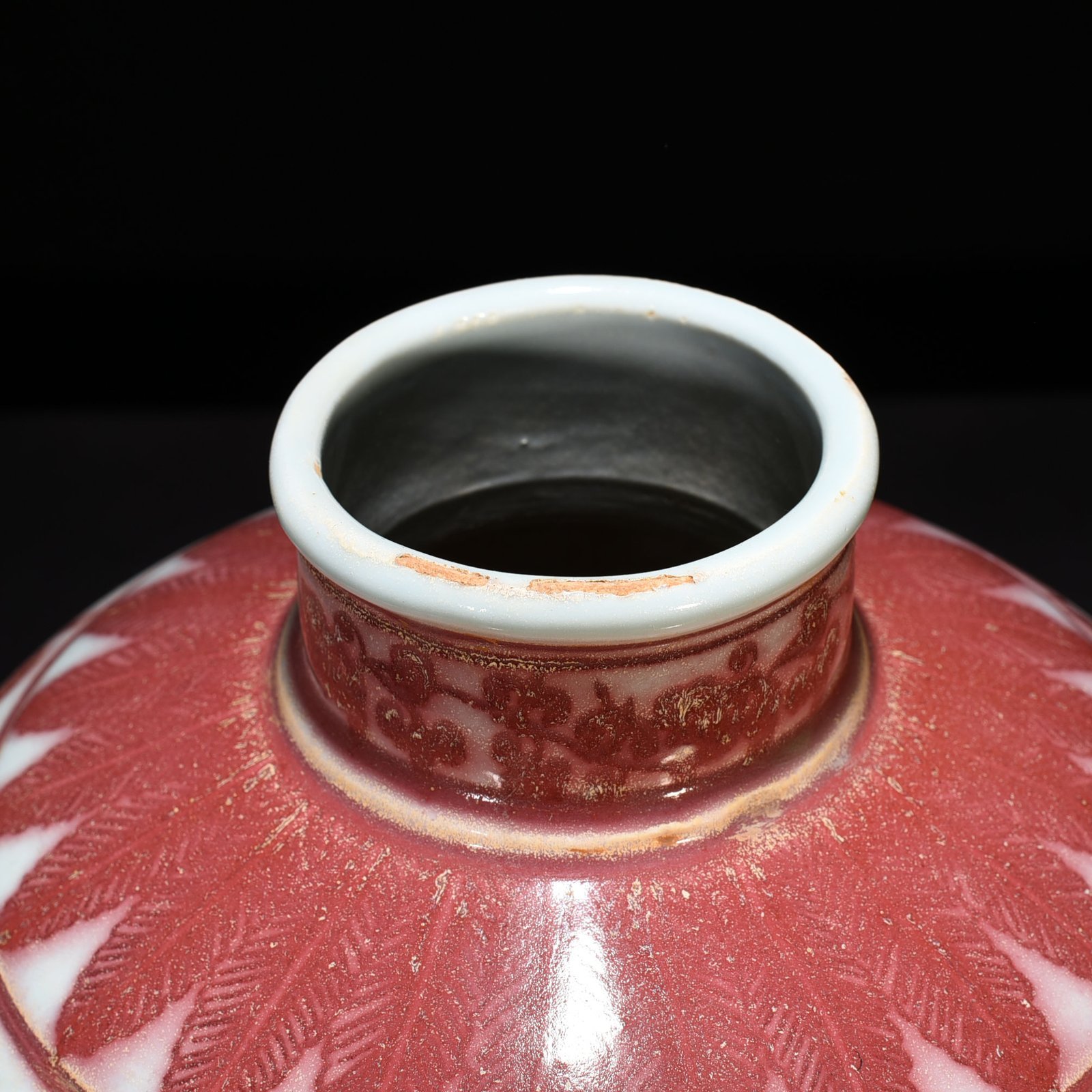 Ming Dynasty Xuande underglaze red plum vase with folded branches