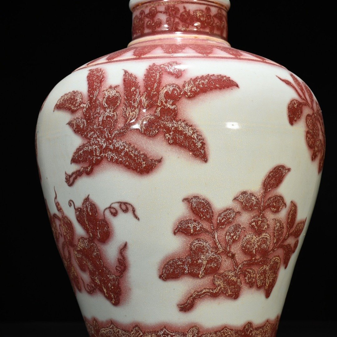 Ming Dynasty Xuande underglaze red plum vase with folded branches