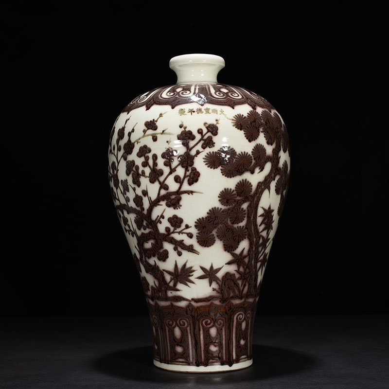 Ming Dynasty Xuande underglaze red pine bamboo and plum vase